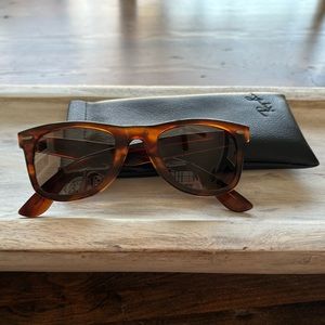 Ray Ban women’s vintage style sunglasses with built in cheaters.